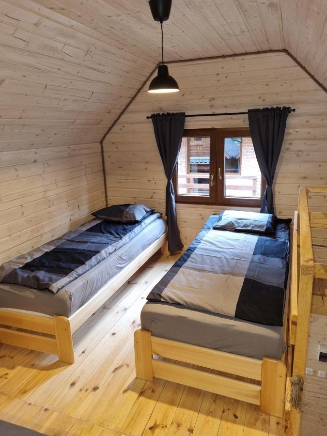 Domki Pod Debami Pobierowo Eksteriør billede